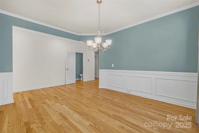 a view of a chandelier in big room