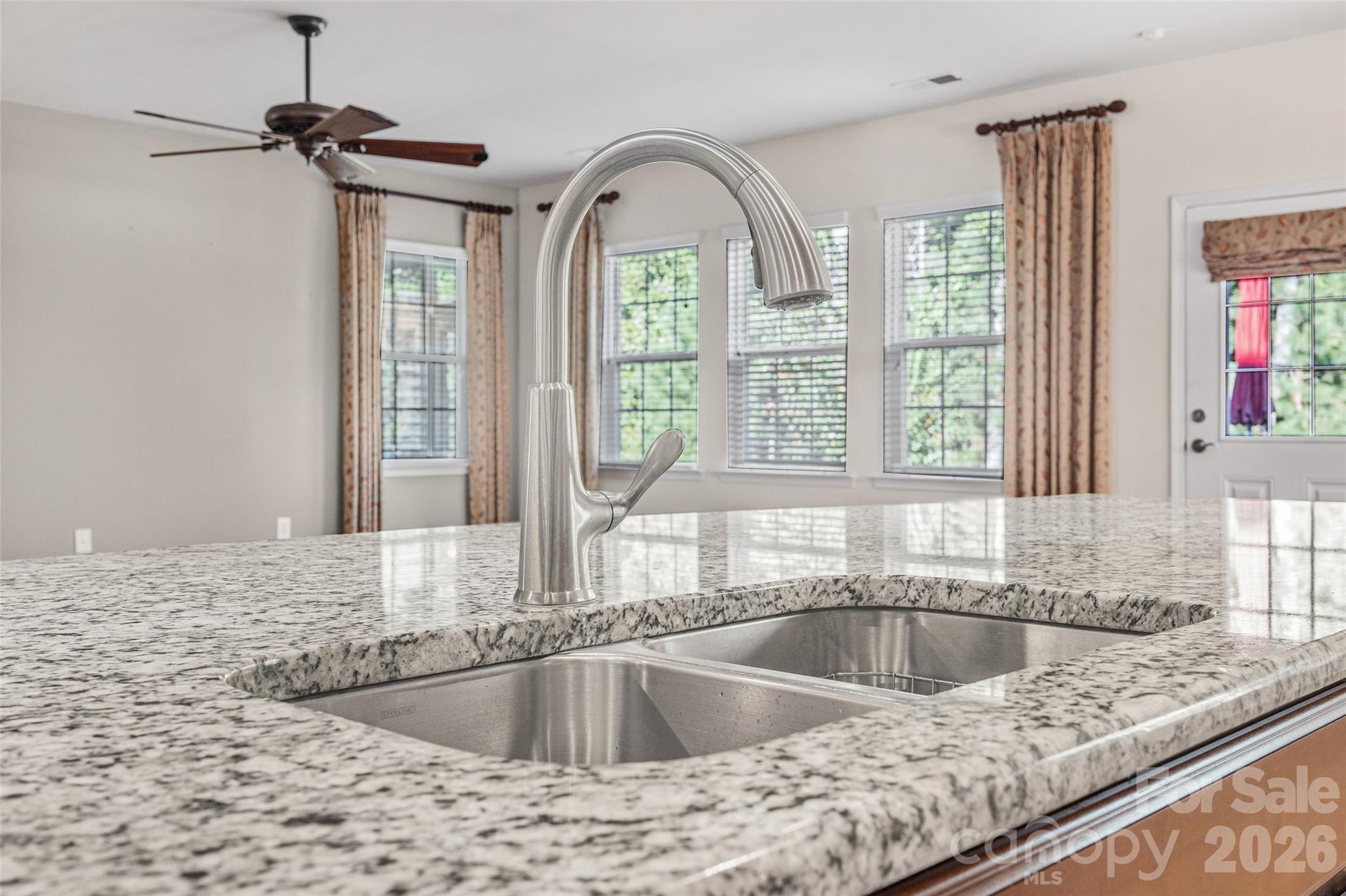 4201 Perth Road Fort Mill, SC 29707 - Photo 13 of 35 a view of a kitchen counter top a stove and wooden floor