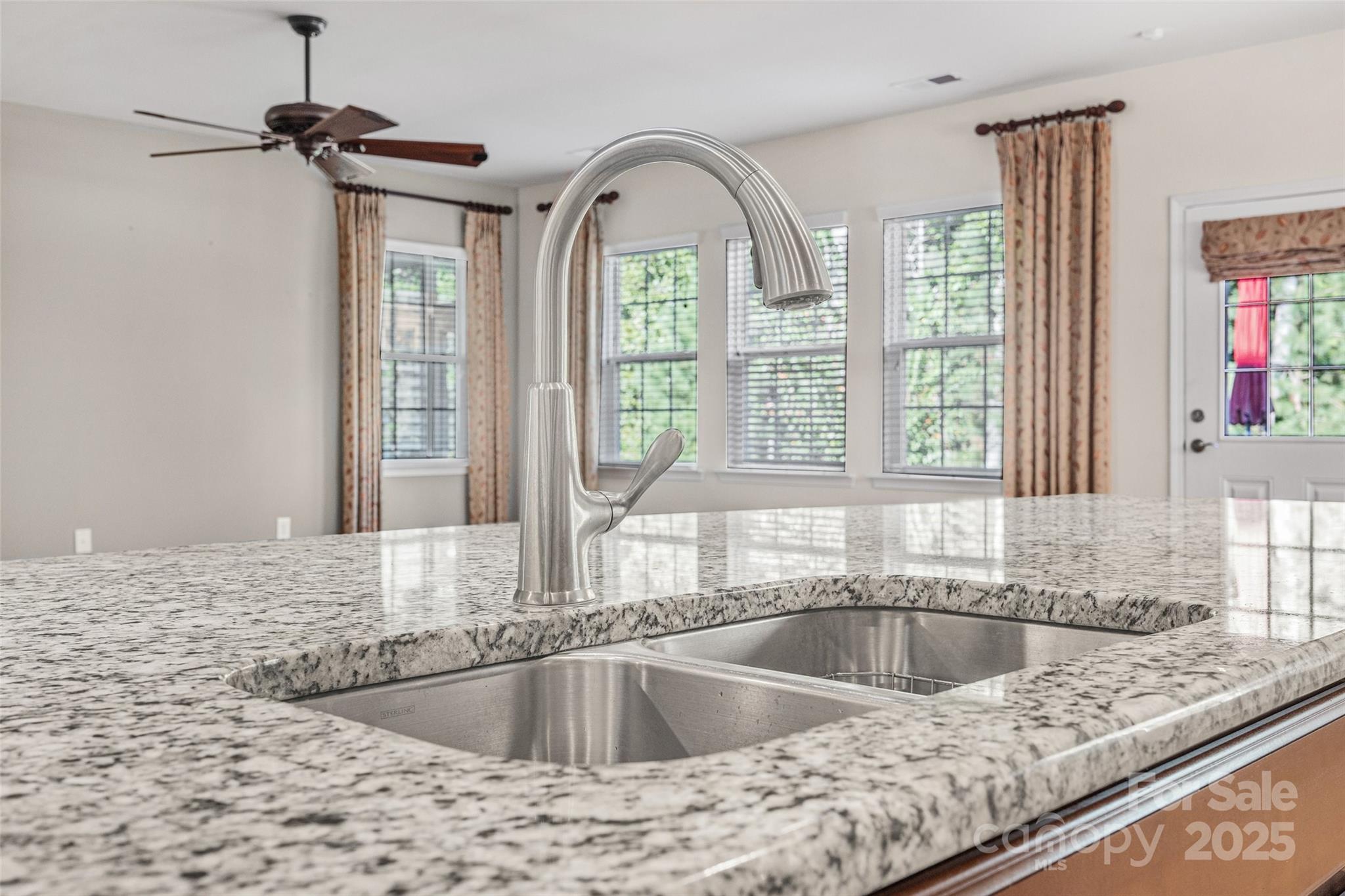 4201 Perth Road Fort Mill, SC 29707 - Photo 18 of 38 a view of a kitchen counter top a stove and wooden floor