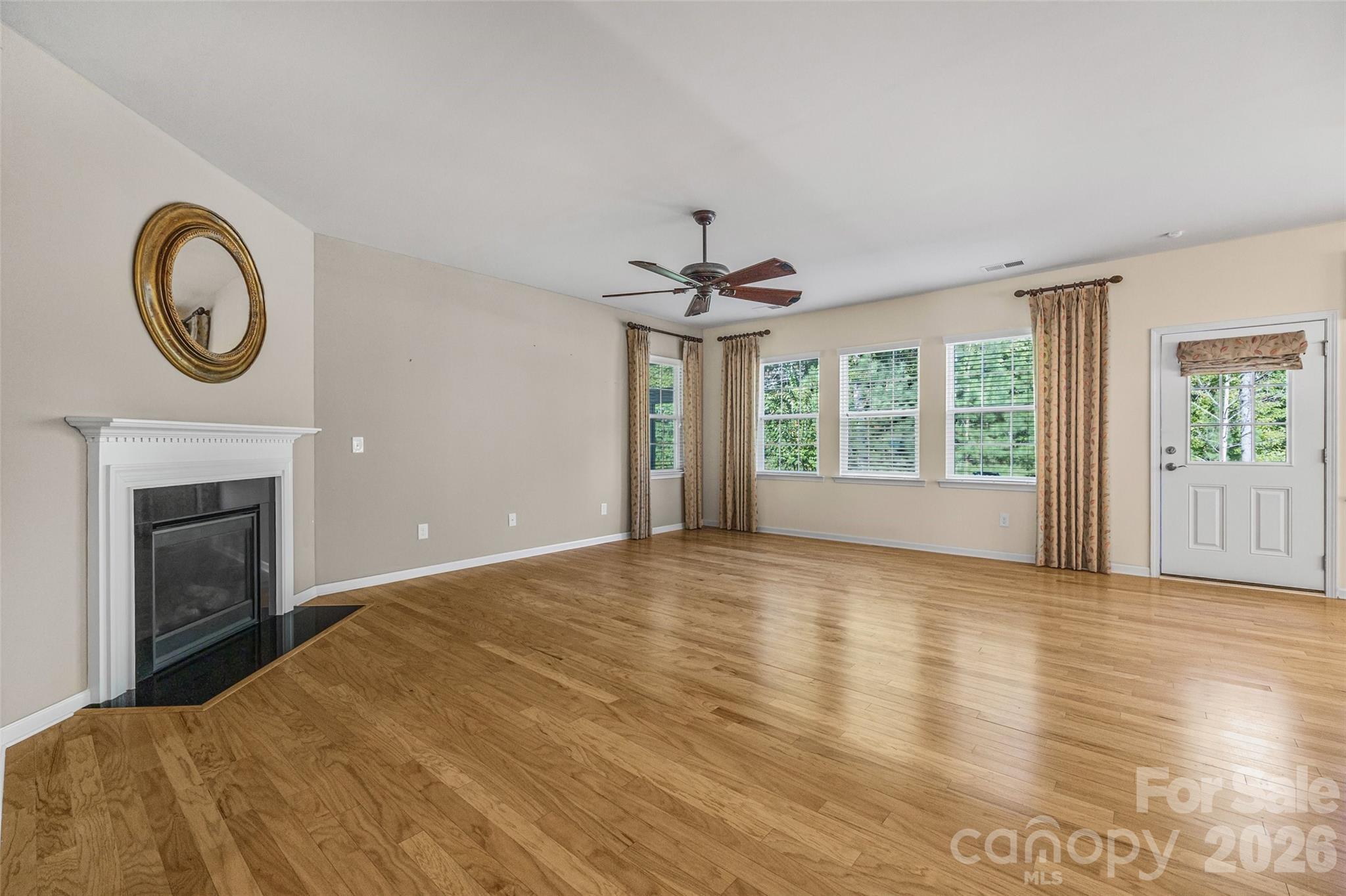 4201 Perth Road Fort Mill, SC 29707 - Photo 21 of 35 a view of empty room with window and fireplace