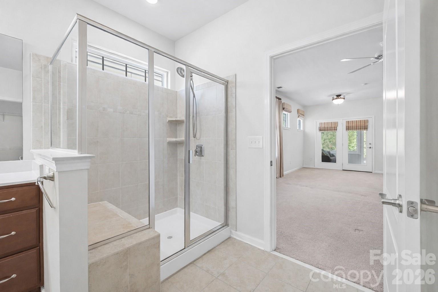 4201 Perth Road Fort Mill, SC 29707 - Photo 23 of 35 a bathroom with a glass shower door and a sink