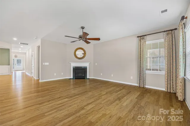 a view of livingroom and hardwood floor
