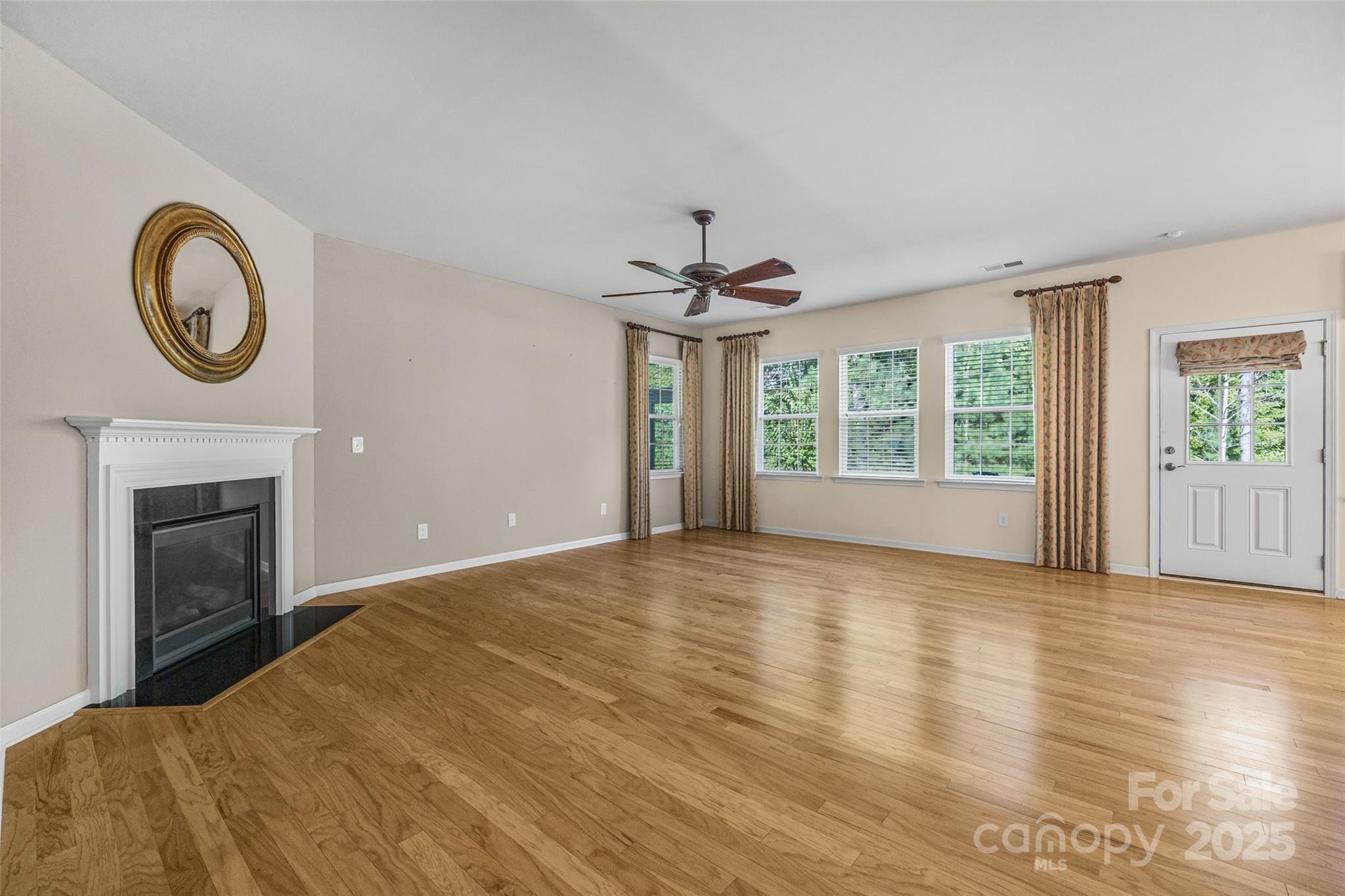 4201 Perth Road Fort Mill, SC 29707 - Photo 26 of 38 a view of empty room with window and fireplace