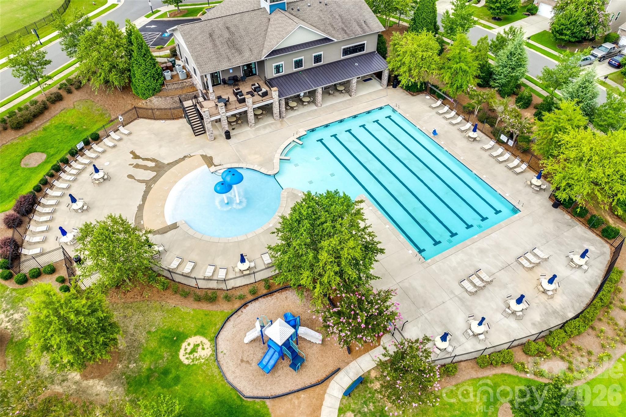 4201 Perth Road Fort Mill, SC 29707 - Photo 32 of 35 an aerial view of a swimming pool with a yard and sitting area