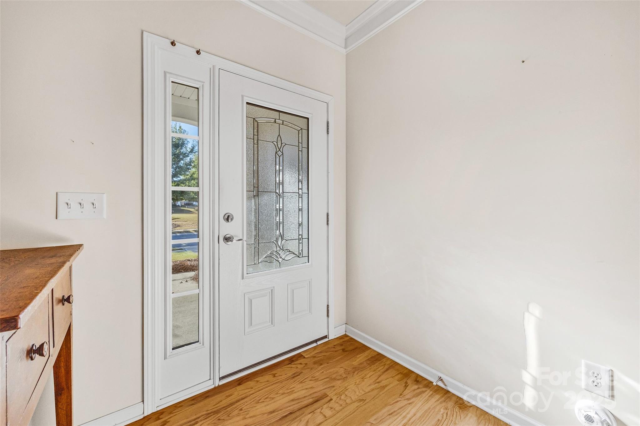 4201 Perth Road Fort Mill, SC 29707 - Photo 4 of 38 an empty room with wooden floor and windows