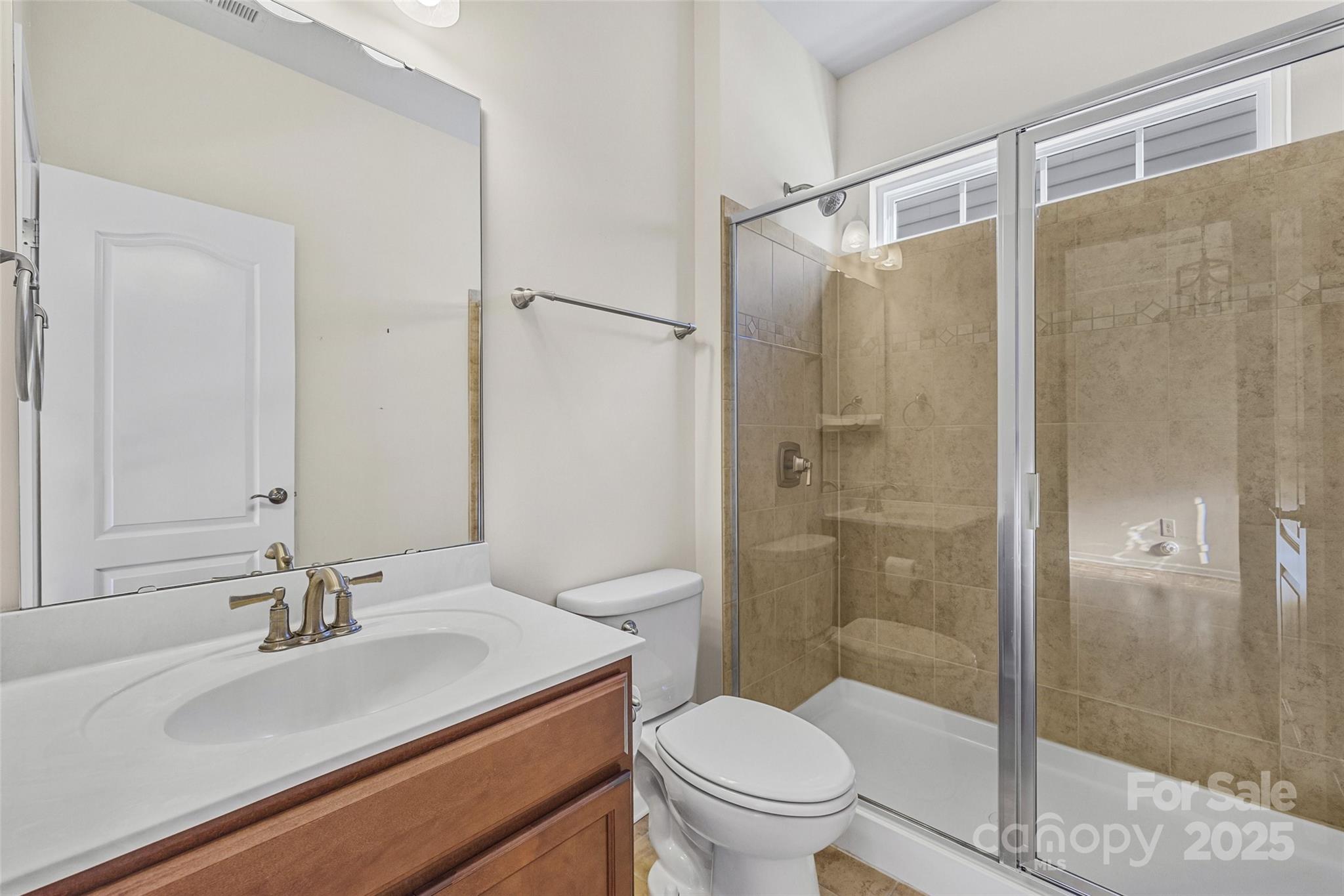 4201 Perth Road Fort Mill, SC 29707 - Photo 7 of 38 a bathroom with a sink toilet and shower