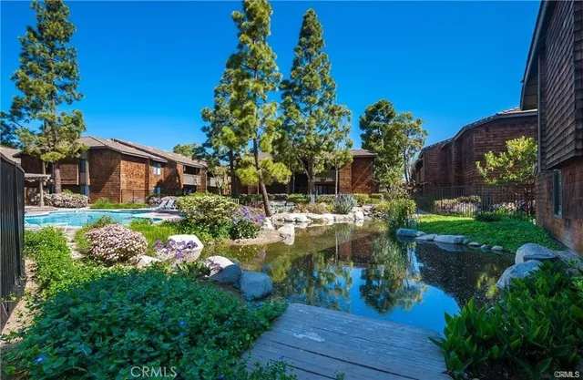 a view of a garden with a fountain