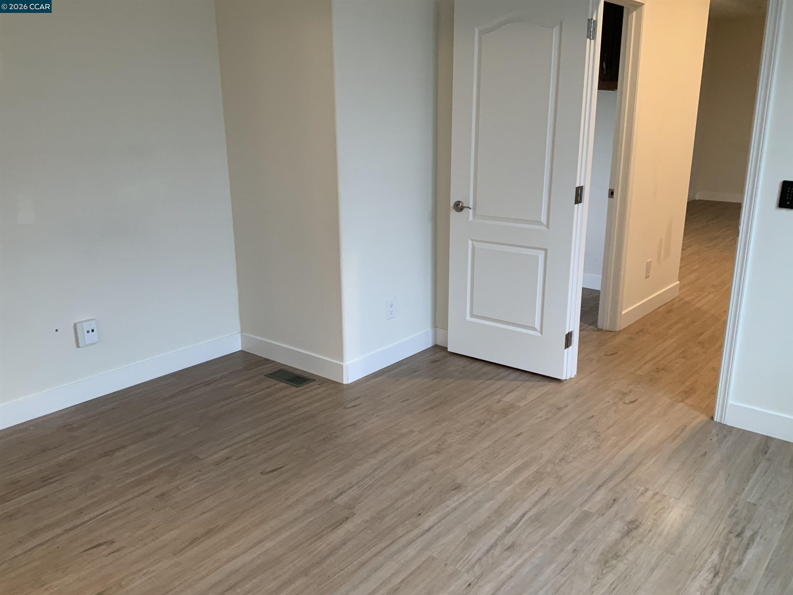 65 Pali Way Pittsburg, CA 94565 - Photo 11 of 32 a view of a room with wooden floor