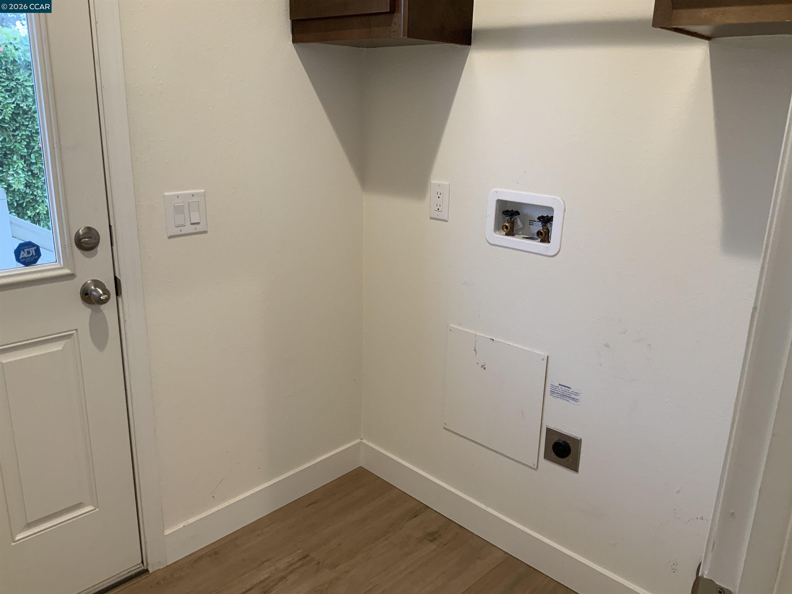 65 Pali Way Pittsburg, CA 94565 - Photo 18 of 32 a view of a hallway with wooden floor