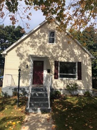 83 Dana Street Springfield, MA 01104 - Photo 1 of 20 a front view of a house with stairs
