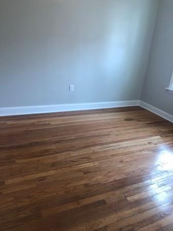 83 Dana Street Springfield, MA 01104 - Photo 14 of 20 a view of a room with wooden floor