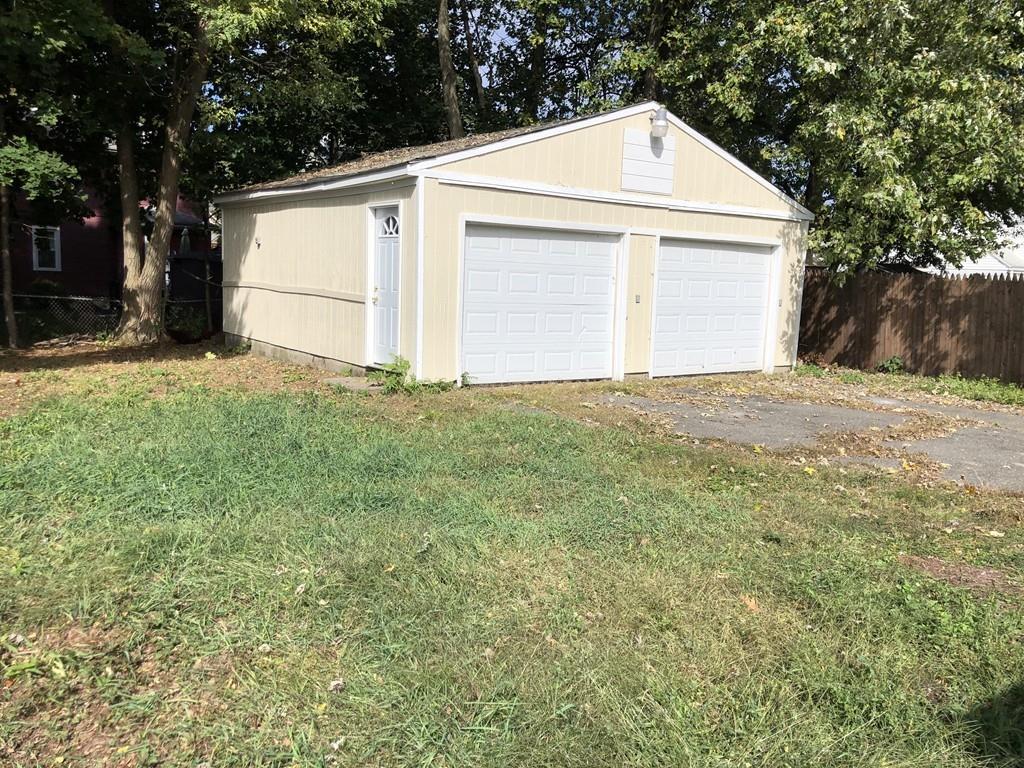 83 Dana Street Springfield, MA 01104 - Photo 18 of 20 a view of garage and yard