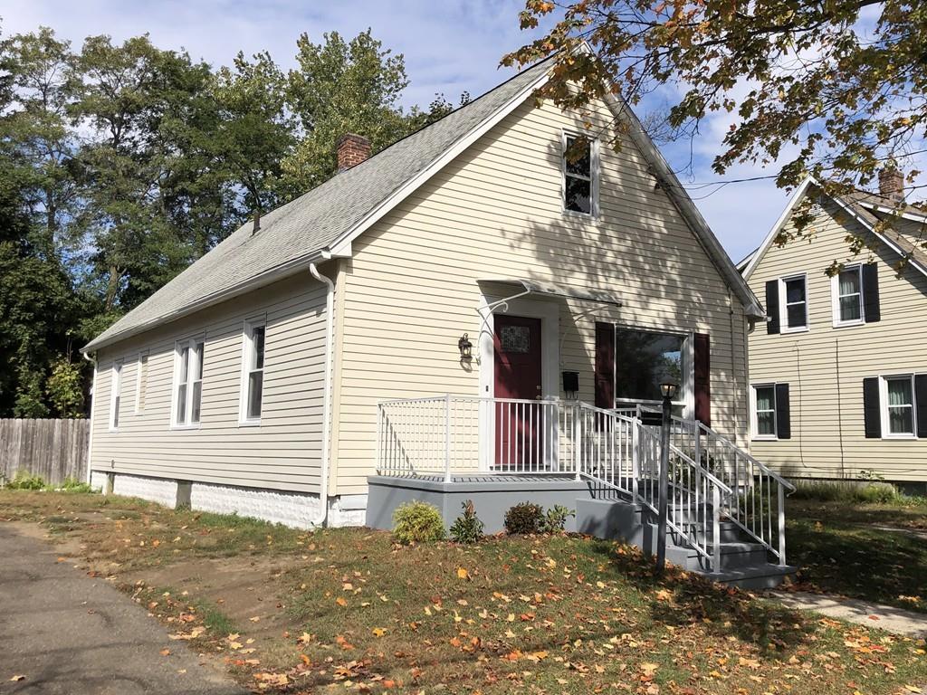 83 Dana Street Springfield, MA 01104 - Photo 2 of 20 a view of house with a yard and sitting area