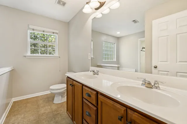 a bathroom with a tub and shower