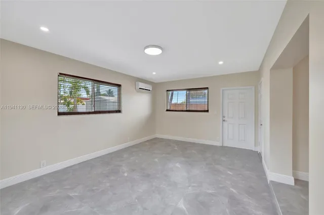 a utility room with washer and dryer