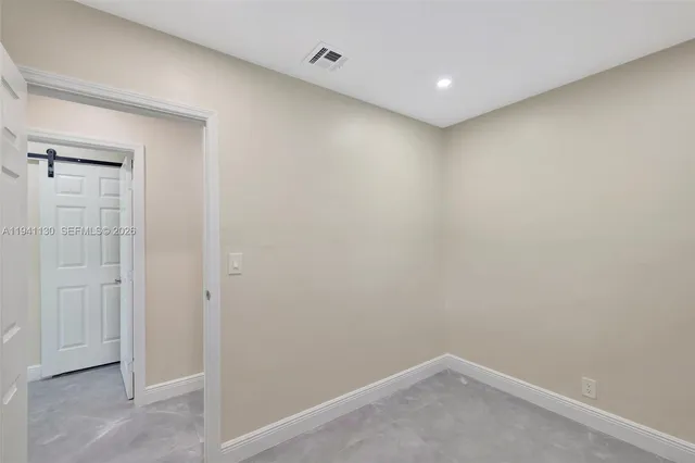 a view of a backyard with plants