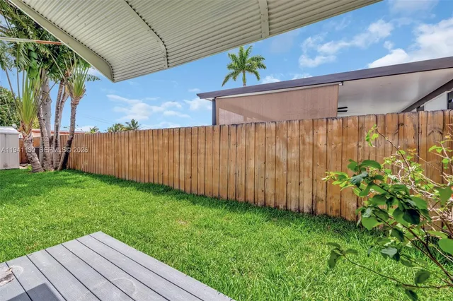a house view with a garden space