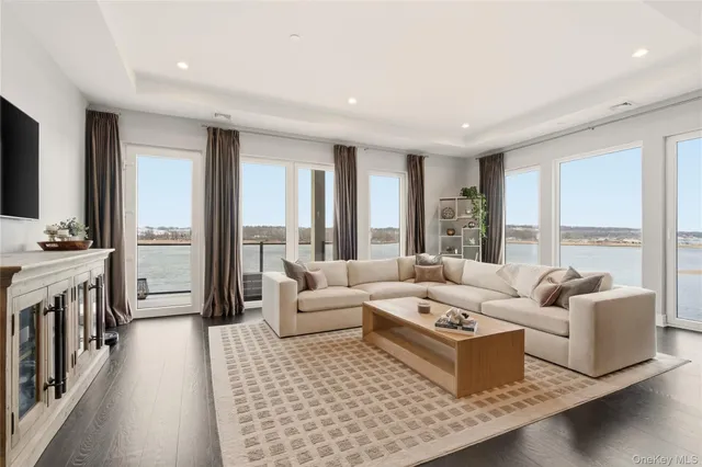 a view of a balcony next to an ocean