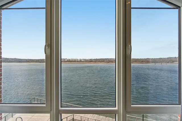 a bedroom with furniture and flat screen tv