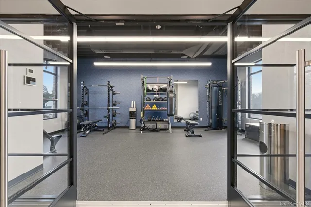 a living room with fireplace furniture and a flat screen tv