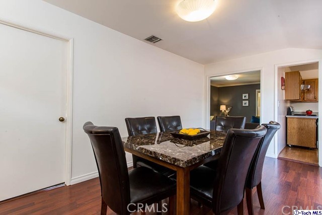 1707 Arlington Avenue Glendale, CA 91208 - Photo 11 of 39 a view of a dining room with furniture and wooden floor