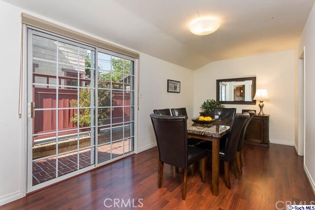 1707 Arlington Avenue Glendale, CA 91208 - Photo 12 of 39 a view of a dining room with furniture window and wooden floor
