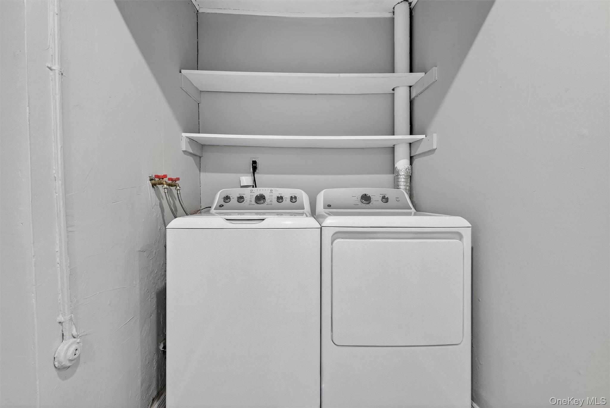 98 South Mount Airy Road Croton-on-Hudson, NY 10520 - Photo 23 of 36 a utility room with dryer and washer