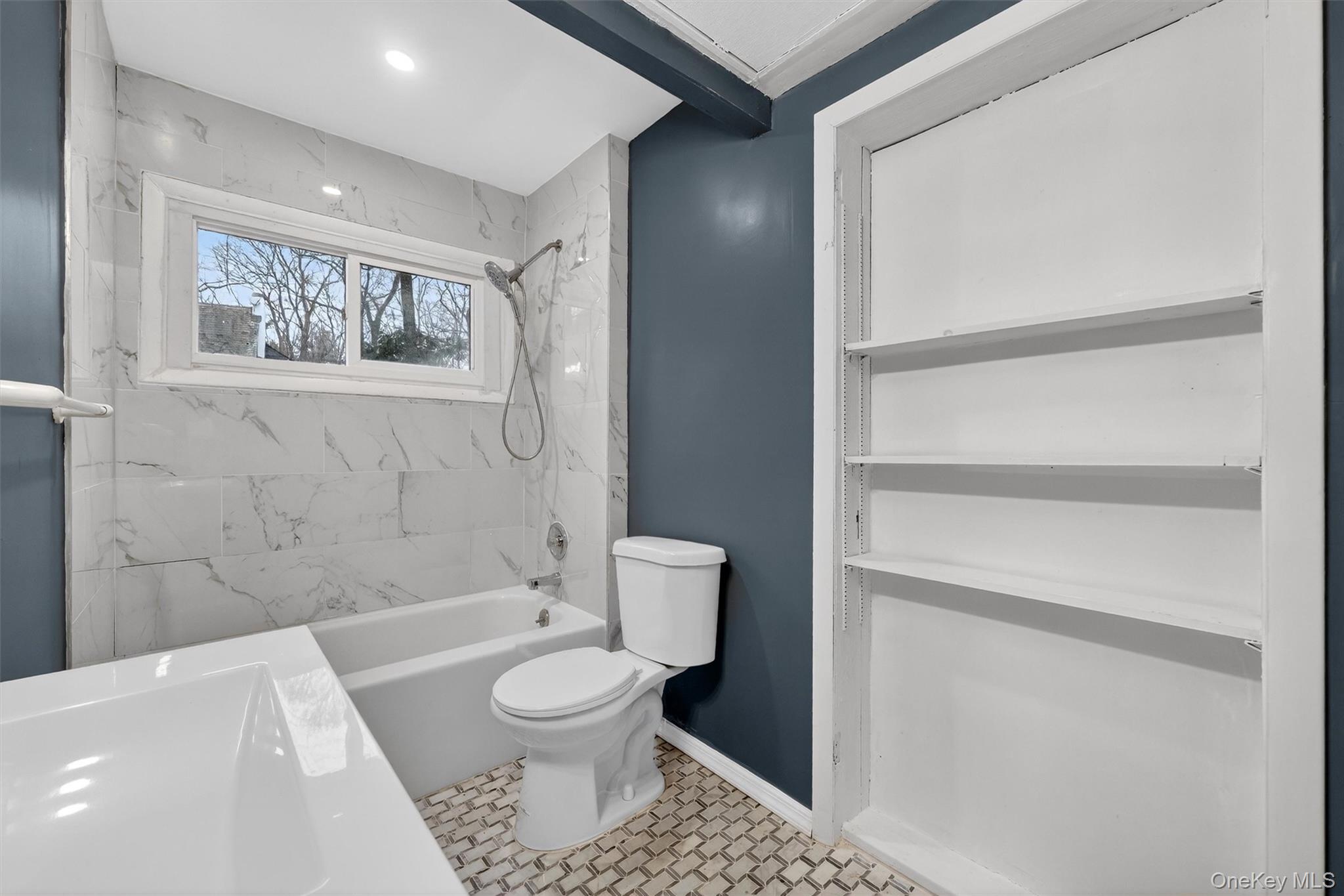 98 South Mount Airy Road Croton-on-Hudson, NY 10520 - Photo 27 of 36 a bathroom with a toilet a sink and bathtub