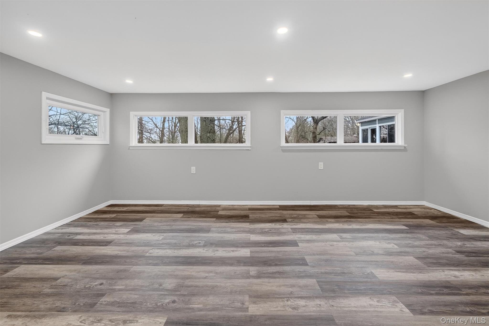 98 South Mount Airy Road Croton-on-Hudson, NY 10520 - Photo 30 of 36 a view of an empty room with wooden floor and window