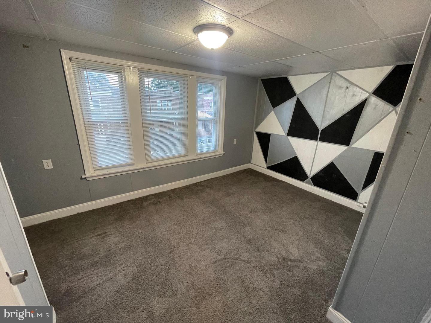1124 Thomas Street Chester, PA 19013 - Photo 8 of 11 an empty room with windows