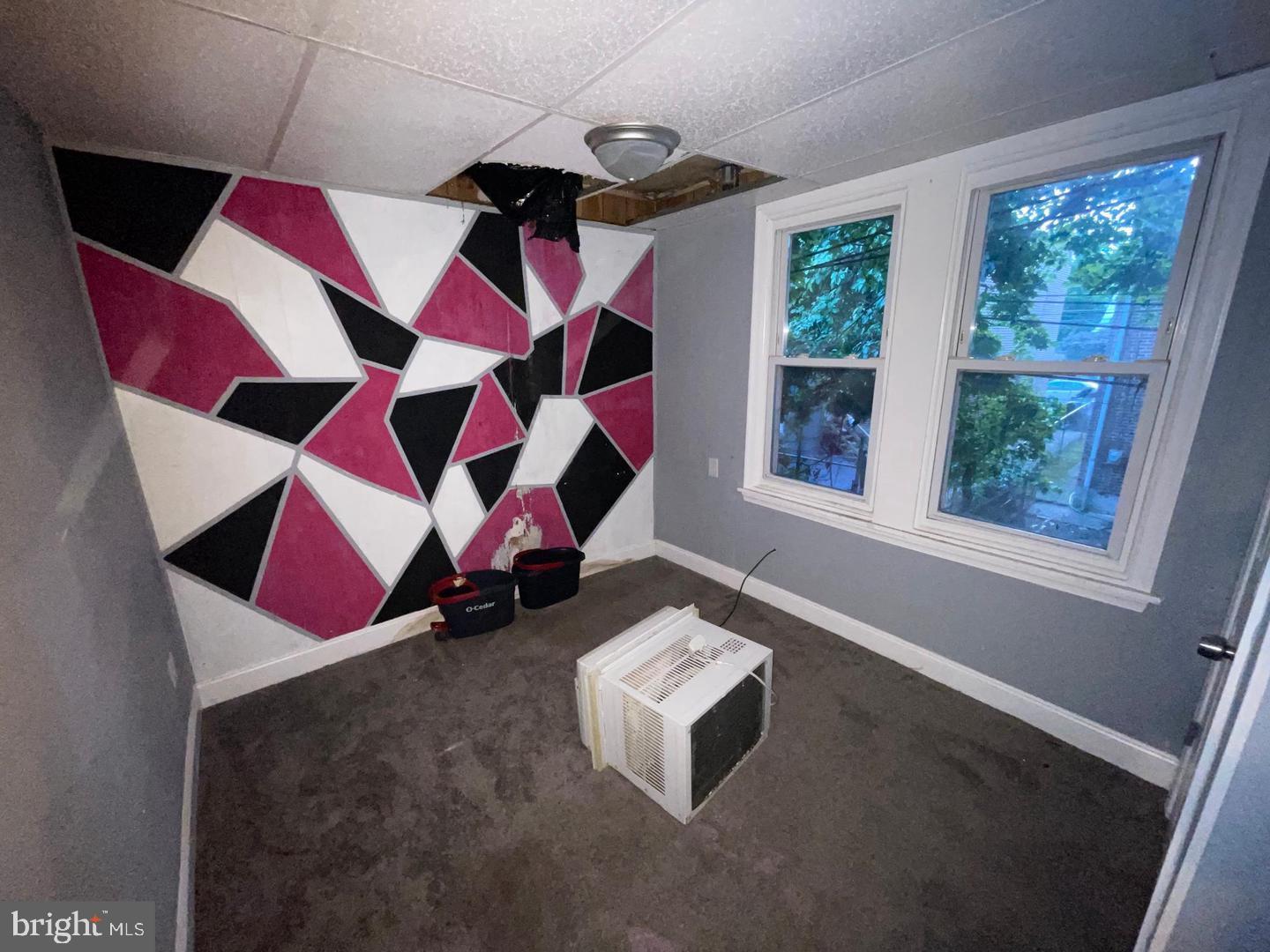 1124 Thomas Street Chester, PA 19013 - Photo 10 of 11 a living room with furniture and a window