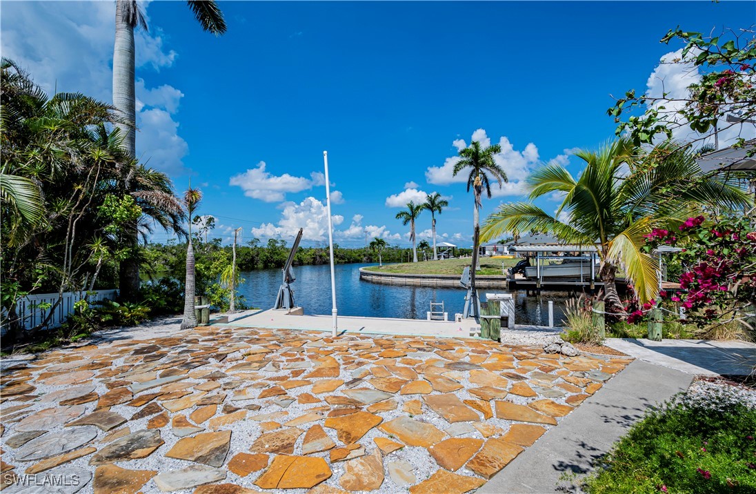 12101 Moon Shell Drive Matlacha Isles, FL 33991 - Photo 40 of 42 a view of a house with a patio