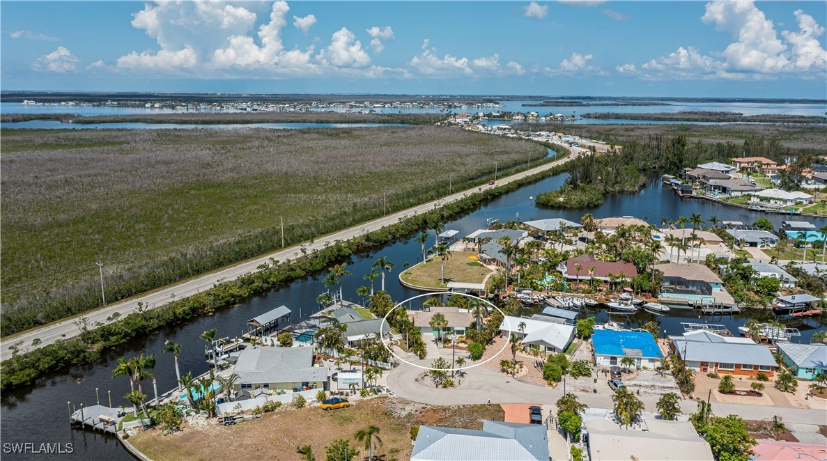 12101 Moon Shell Drive Matlacha Isles, FL 33991 - Photo 5 of 42 a view of a balcony with an ocean view