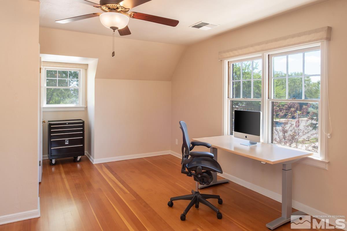 895 Lander Street Reno, NV 89509 - Photo 16 of 38 a view of a workspace with furniture and a window