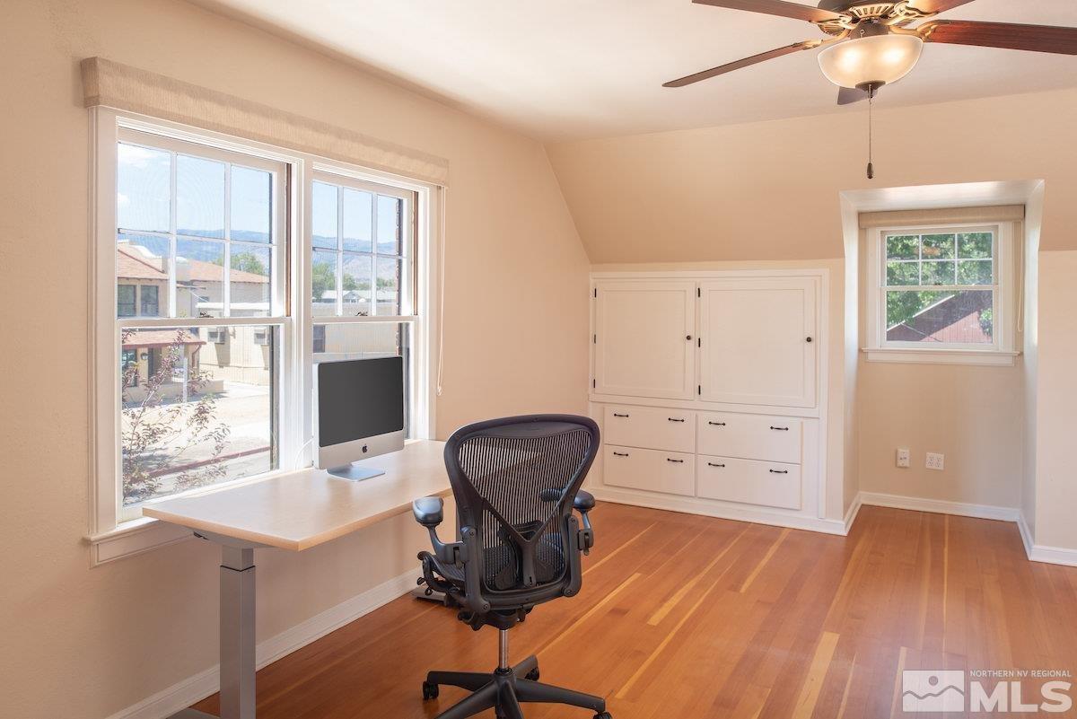 895 Lander Street Reno, NV 89509 - Photo 17 of 38 a view of a workspace with furniture and a window