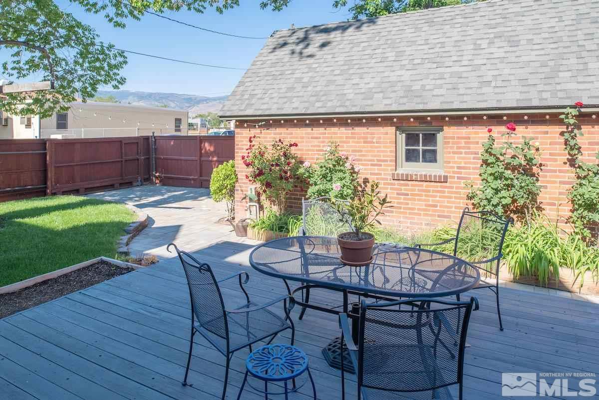 895 Lander Street Reno, NV 89509 - Photo 21 of 38 a patio with table and chairs