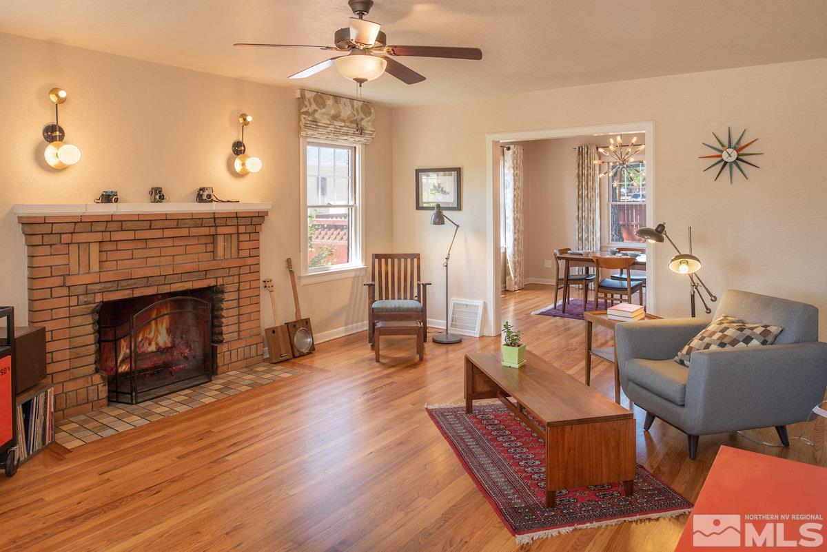 895 Lander Street Reno, NV 89509 - Photo 4 of 38 a living room with furniture and a fireplace