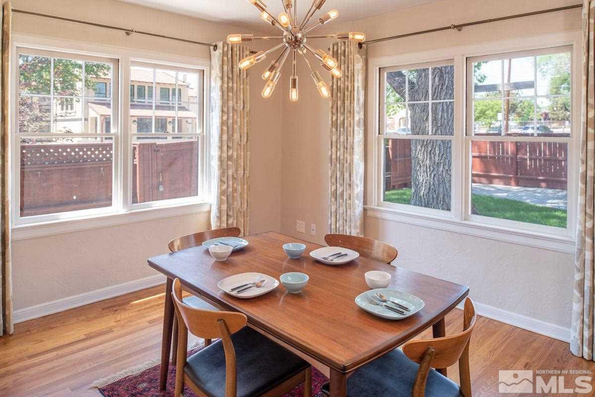 895 Lander Street Reno, NV 89509 - Photo 6 of 38 a view of a dining room with furniture window and outside view