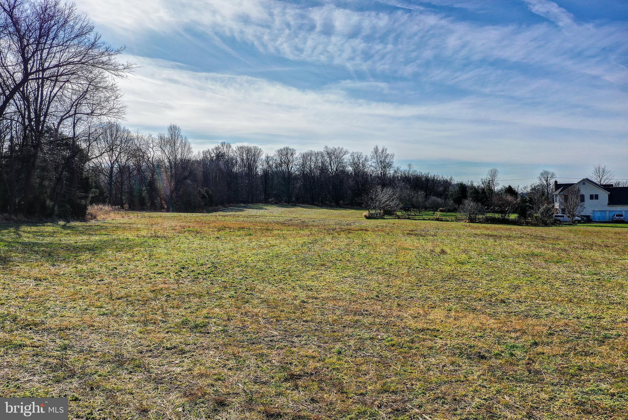 15313 Darnestown Road Germantown, MD 20874 - Photo 13 of 17 a view of a swimming pool and a yard