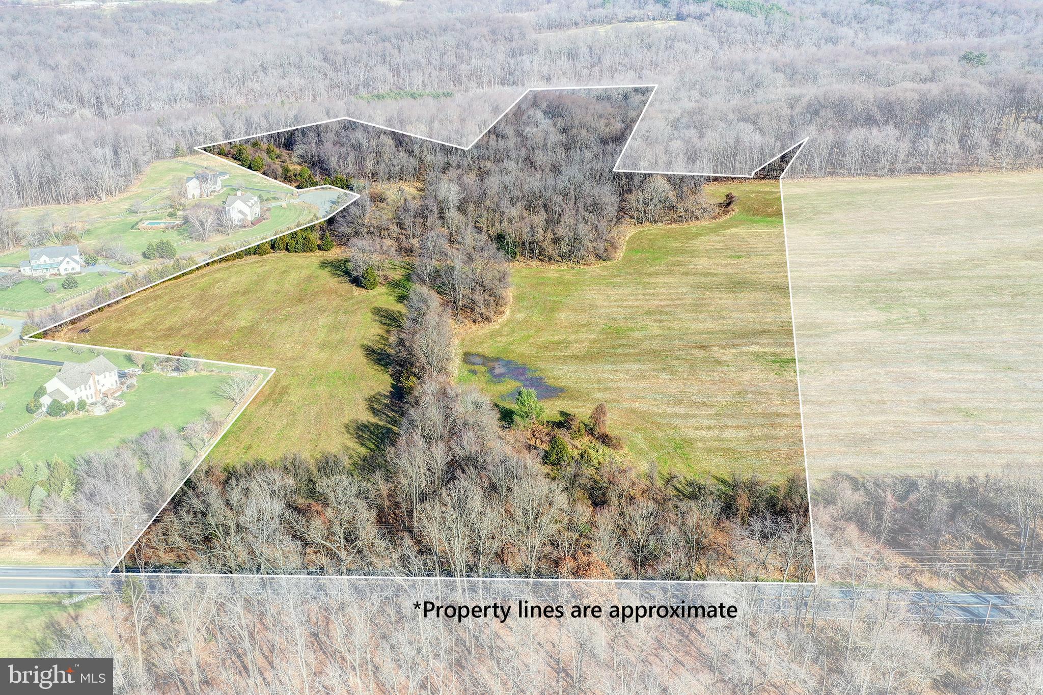 15313 Darnestown Road Germantown, MD 20874 - Photo 2 of 17 a bathroom with a shower
