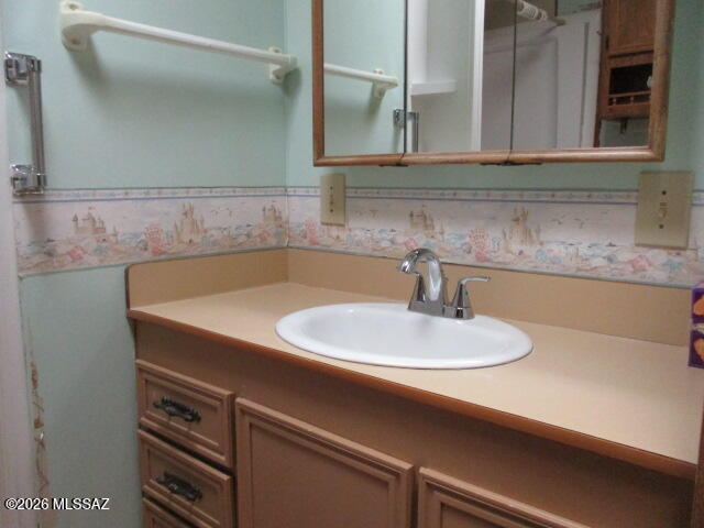 3100 South Kinney Road, Unit 193 Tucson, AZ 85713 - Photo 12 of 35 a bathroom with a sink and a mirror