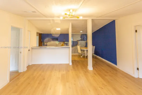 a view of a room with a bathroom