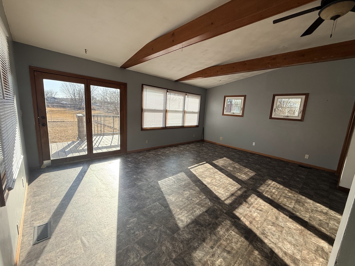 617 West Lincoln Way Morrison, IL 61270 - Photo 4 of 21 wooden floor in an empty room with a window
