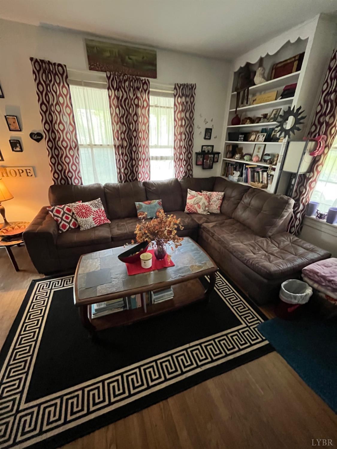 165 Cedar Gate Road Monroe, VA 24574 - Photo 17 of 37 a living room with furniture and a window