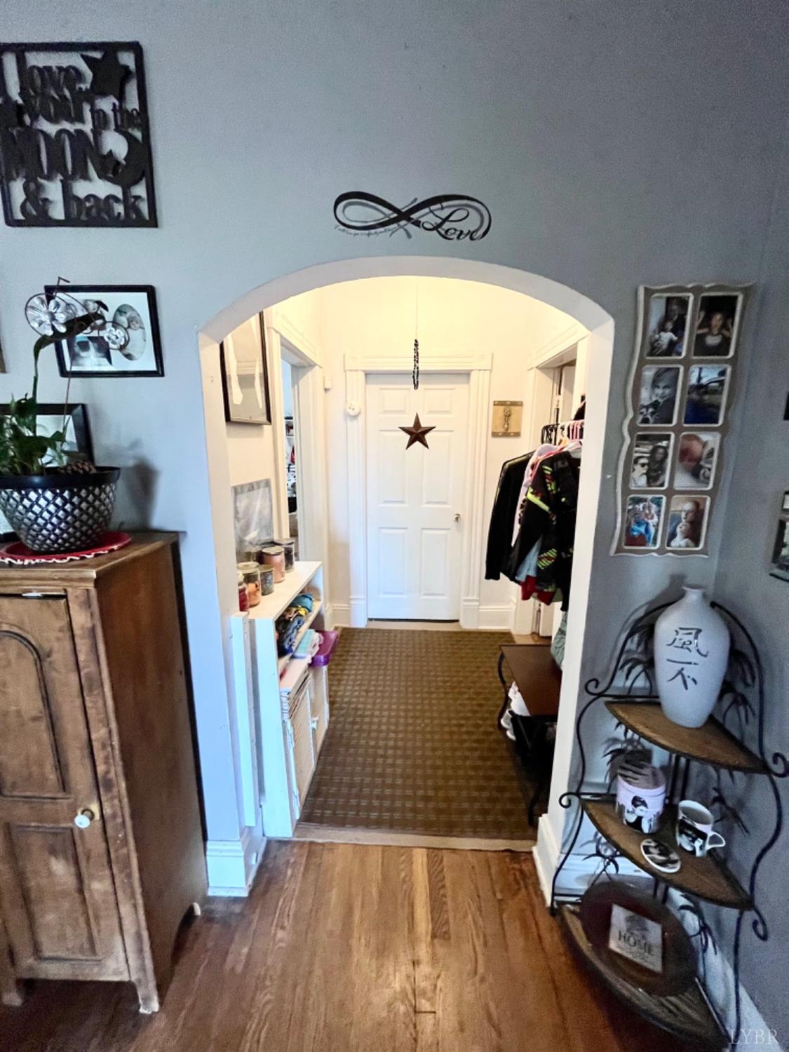 165 Cedar Gate Road Monroe, VA 24574 - Photo 20 of 37 a view of living room with furniture and wooden floor