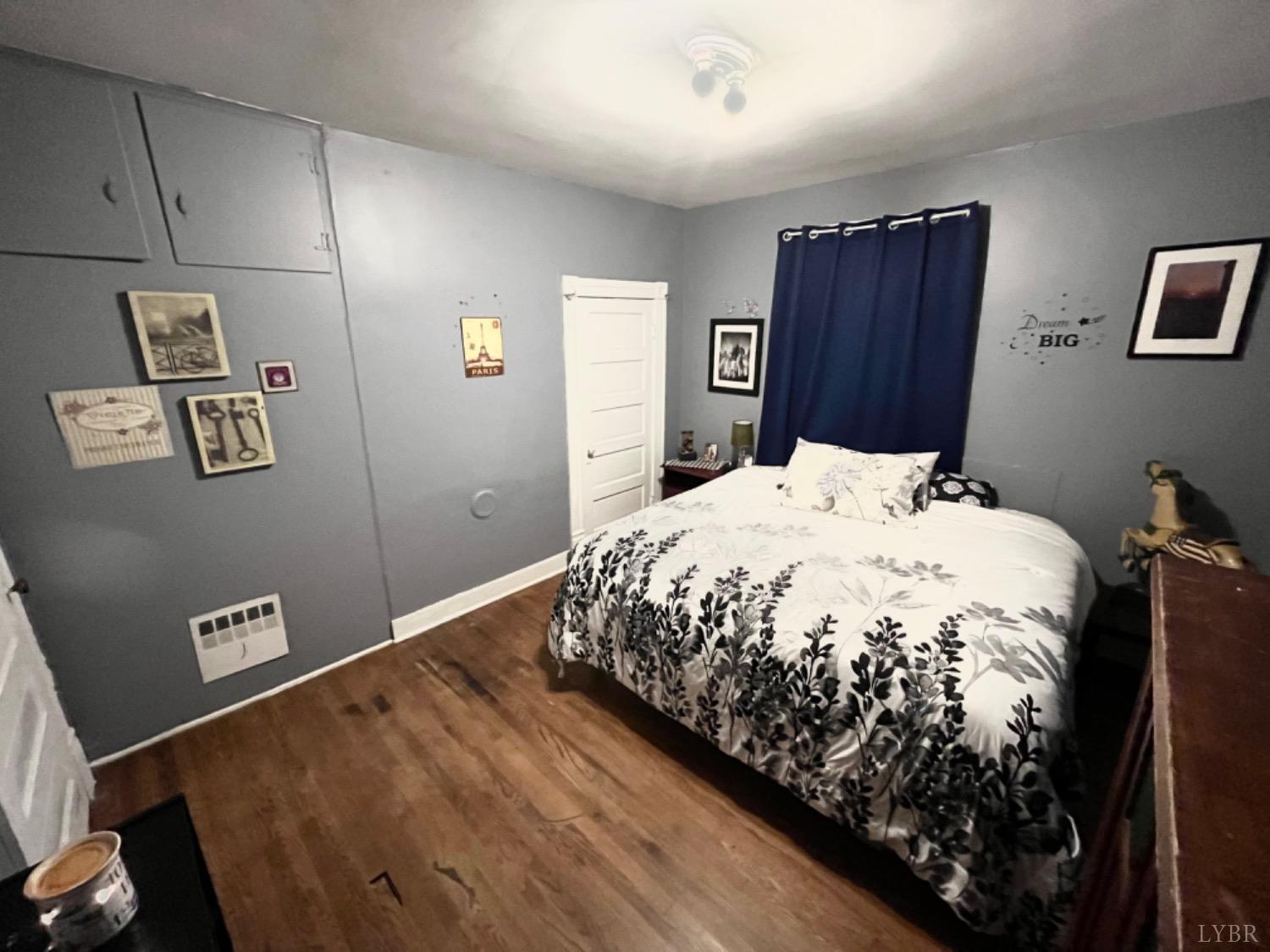 165 Cedar Gate Road Monroe, VA 24574 - Photo 22 of 37 a bedroom with a bed and a desk