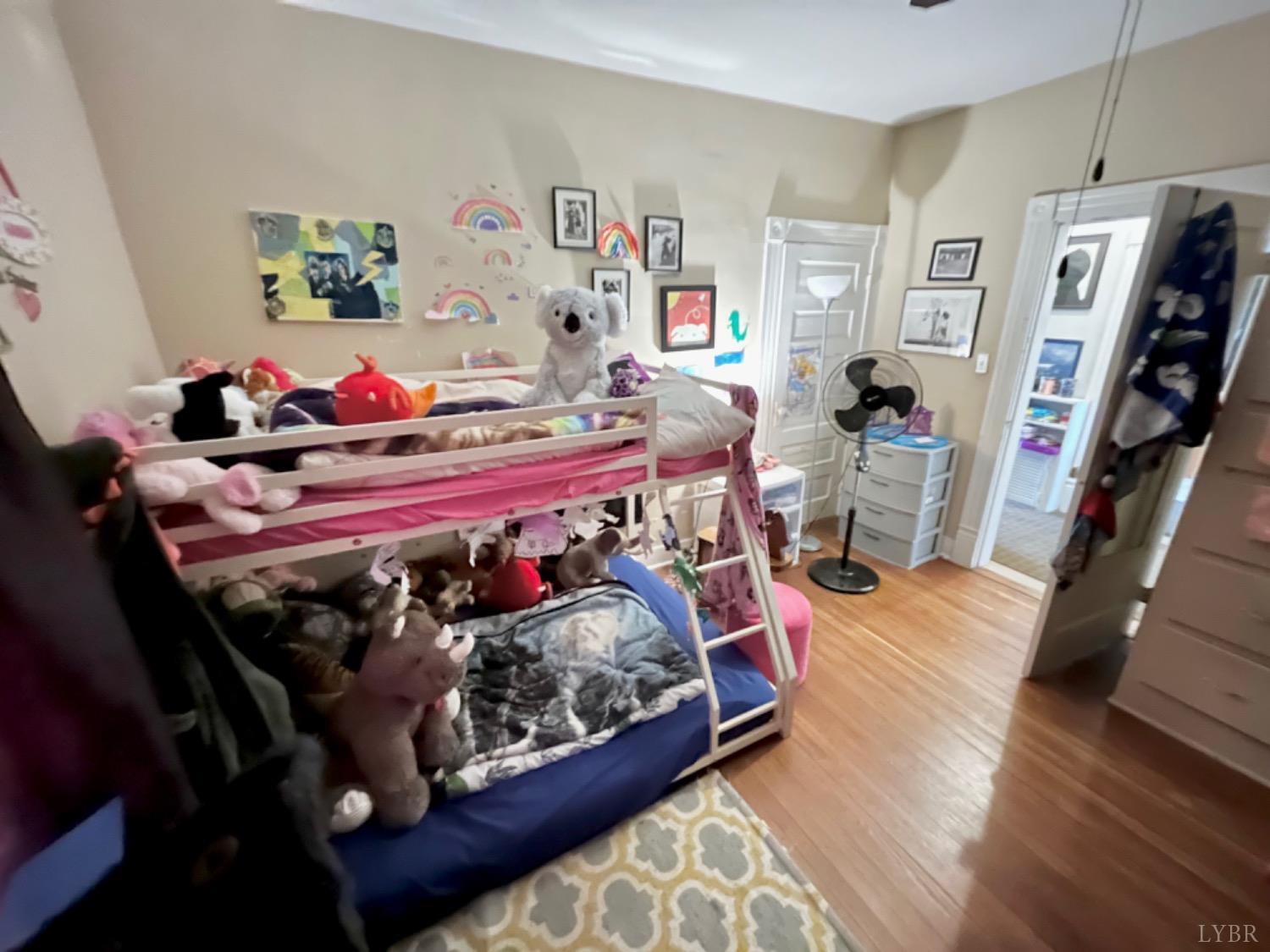 165 Cedar Gate Road Monroe, VA 24574 - Photo 25 of 37 a bed room with a bed and a walk in closet