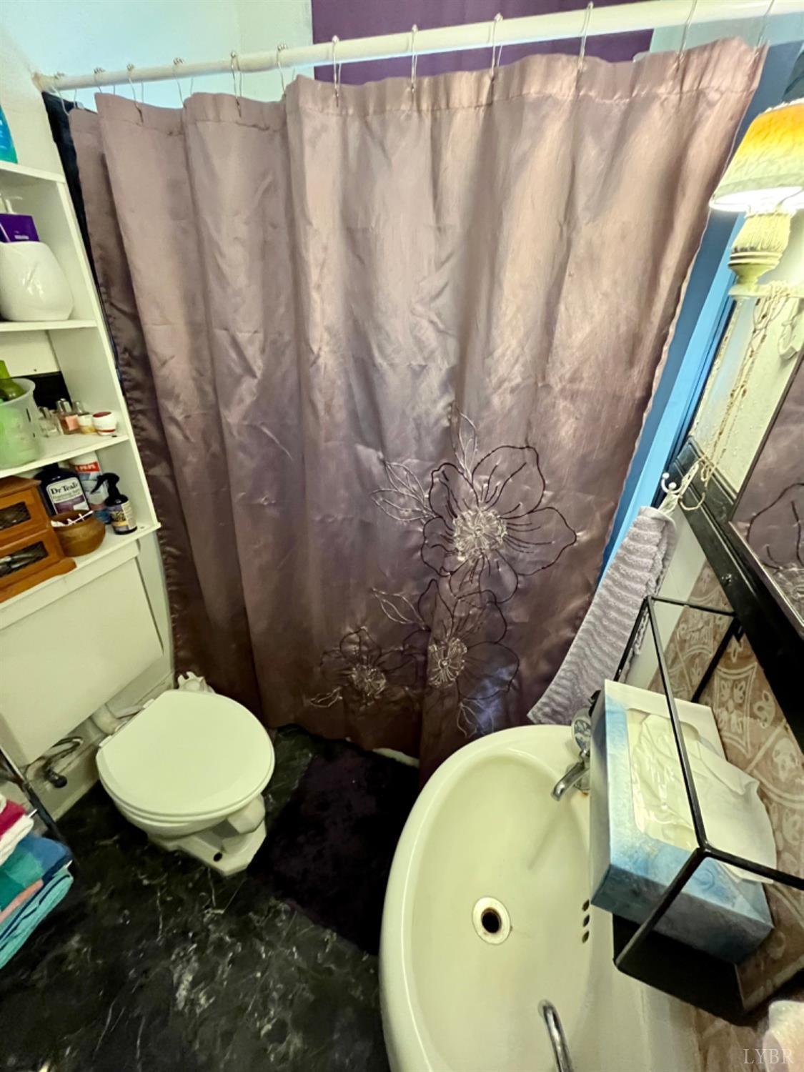 165 Cedar Gate Road Monroe, VA 24574 - Photo 28 of 37 a bathroom with a sink and a mirror