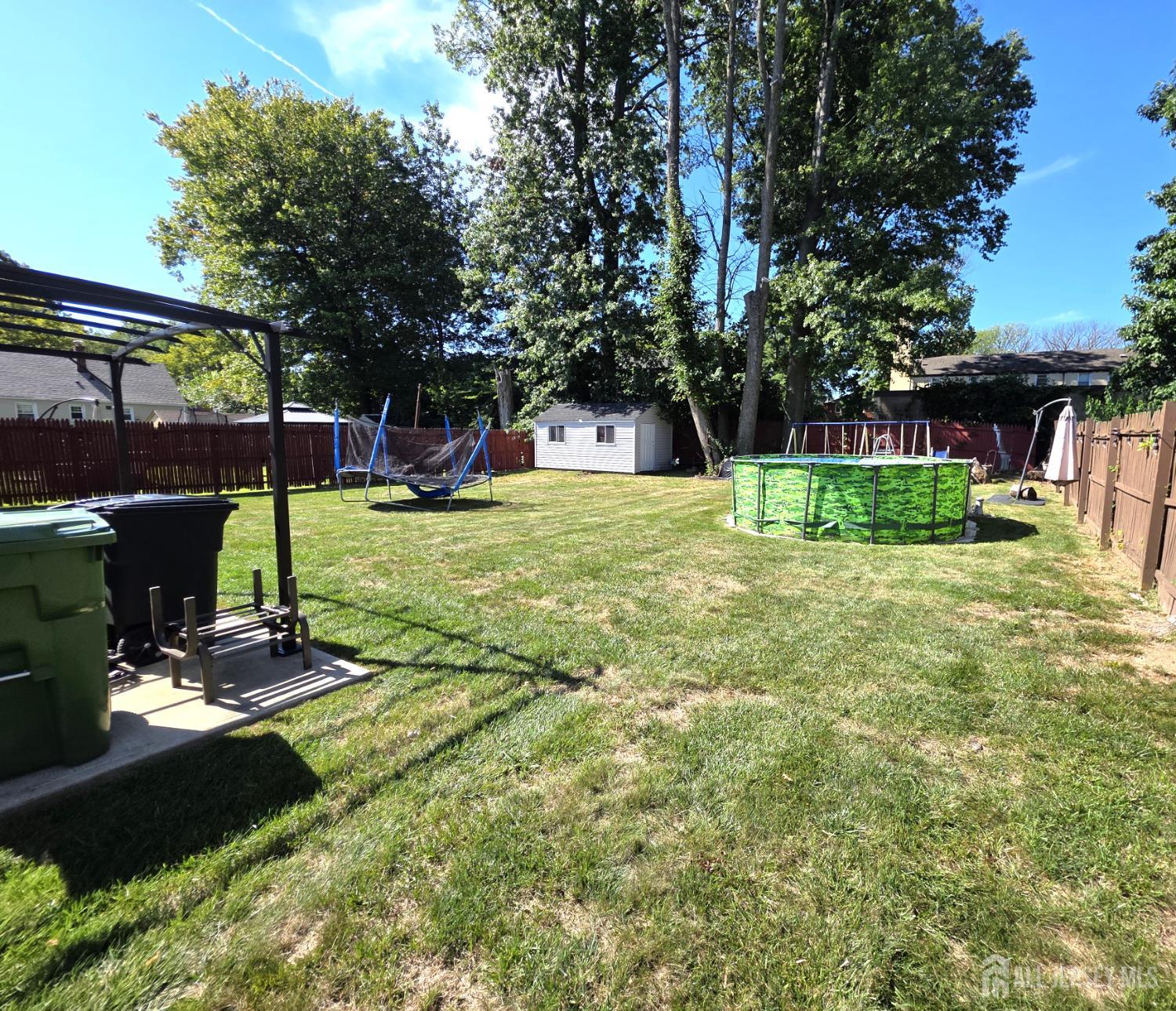 382 Douglas Road Roselle, NJ 07203 - Photo 15 of 17 a view of backyard with green space
