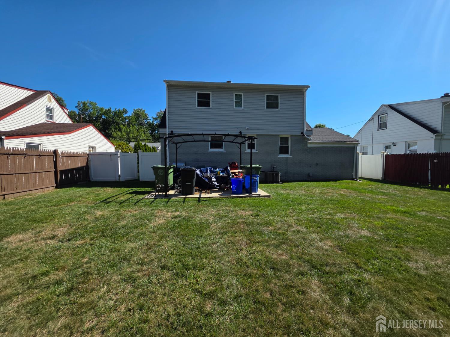 382 Douglas Road Roselle, NJ 07203 - Photo 16 of 17 a front view of house with garden